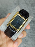 Luxury Cartier Tank Style Gold Rectangular Black Dial Quartz Watch with Black Leather Strap | Classic Dress Wristwatch for Men & Women